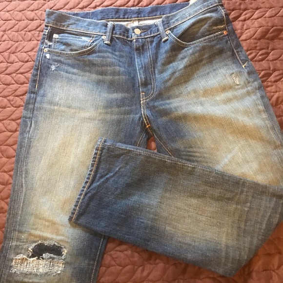 stone washed ripped jeans mens